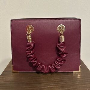 ALDO Burgundy Handbag with Gold Accents